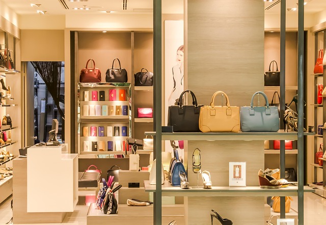 shoe store staff assisting customer